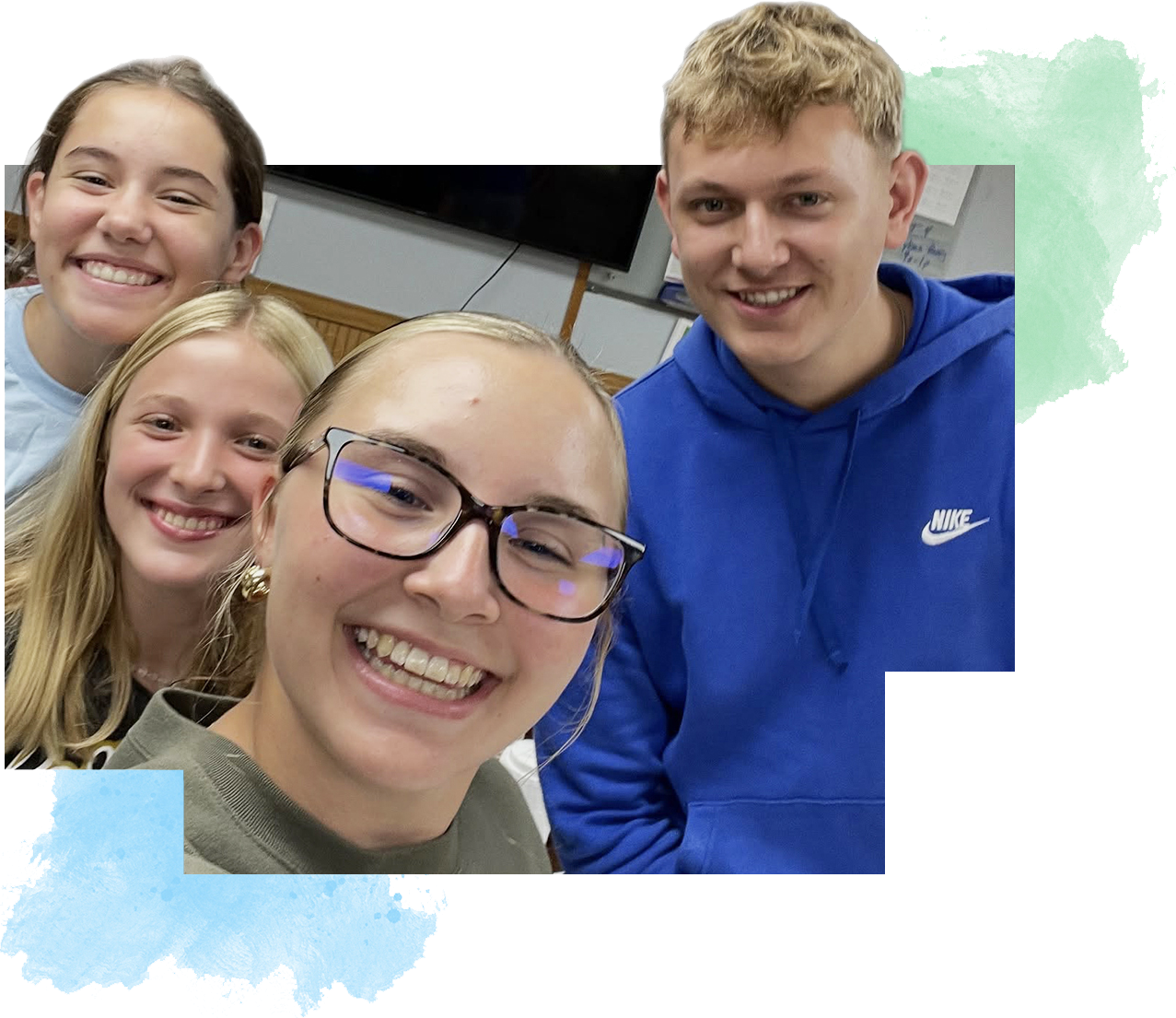 4 kids taking a selfie